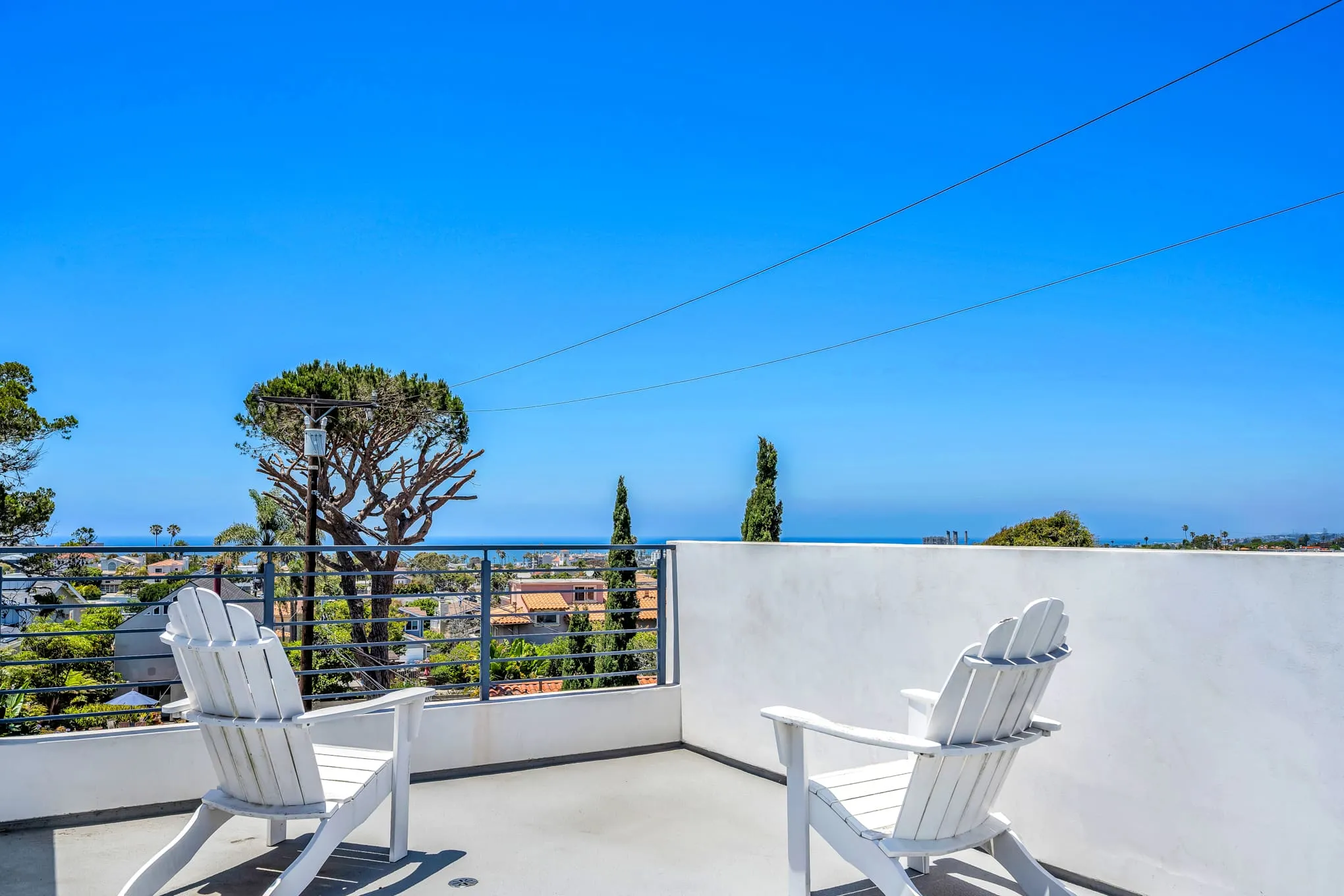 Rooftop deck with ocean views on the horizon