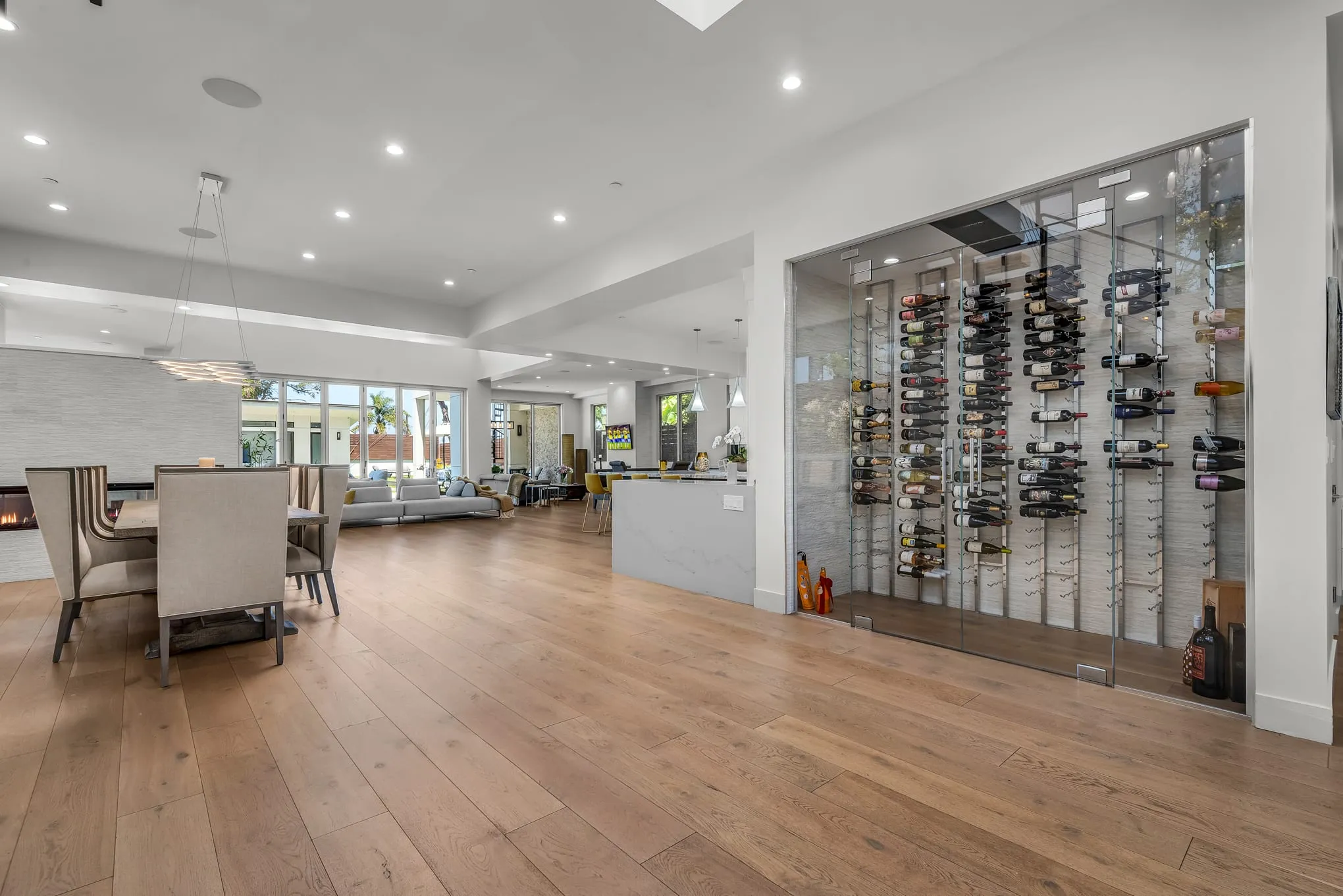 Glass-enclosed wine room off the entry, beside the great room
