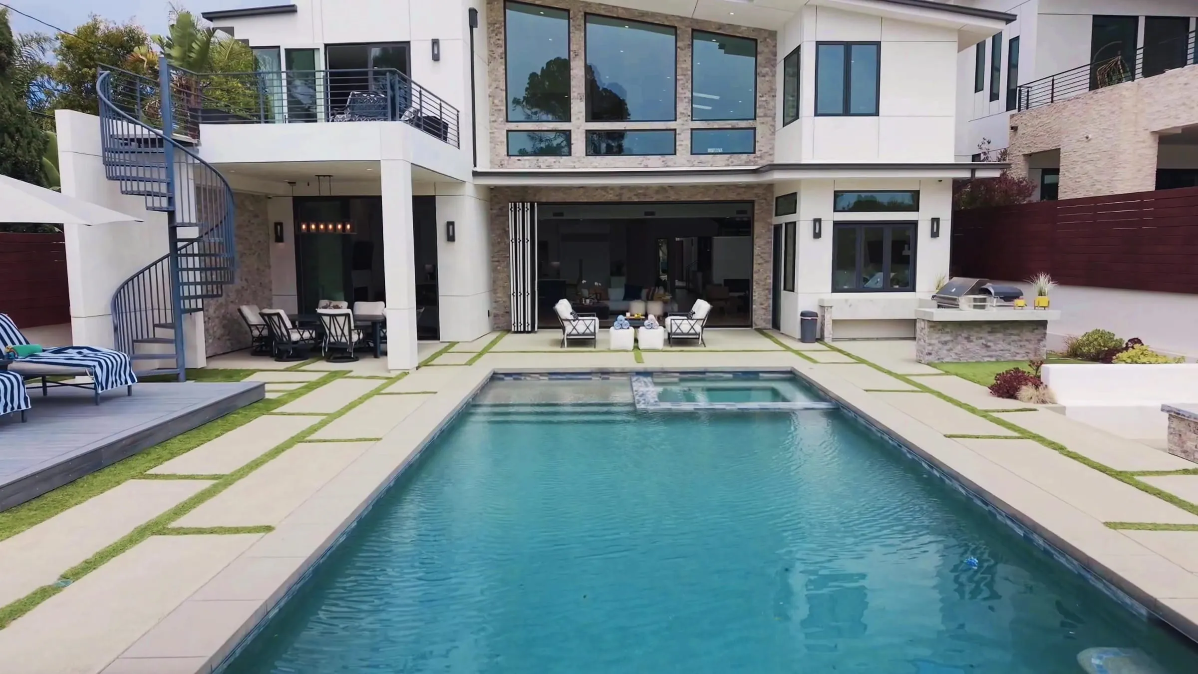 The resort-style pool and backyard at 503 South Lucia
